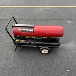 TORO KEROSENE TORPEDO  HEATER. POWERFUL 100,000 BTUS GREAT TO WARMUP YOUR GARAGE OR SMALL WAREHOUSE. TESTED  AND WORKING FINE. $150.00  OR BEST OFFER.