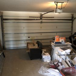 Overhead Garage Door Broken Spring Opener Off Track  Adjustment Replace And Parts 
