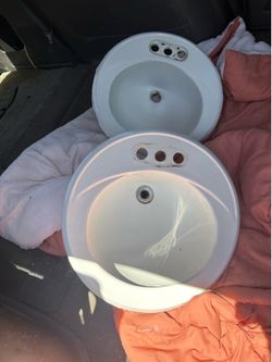 two, drop in sinks, 19 inch diameter great condition