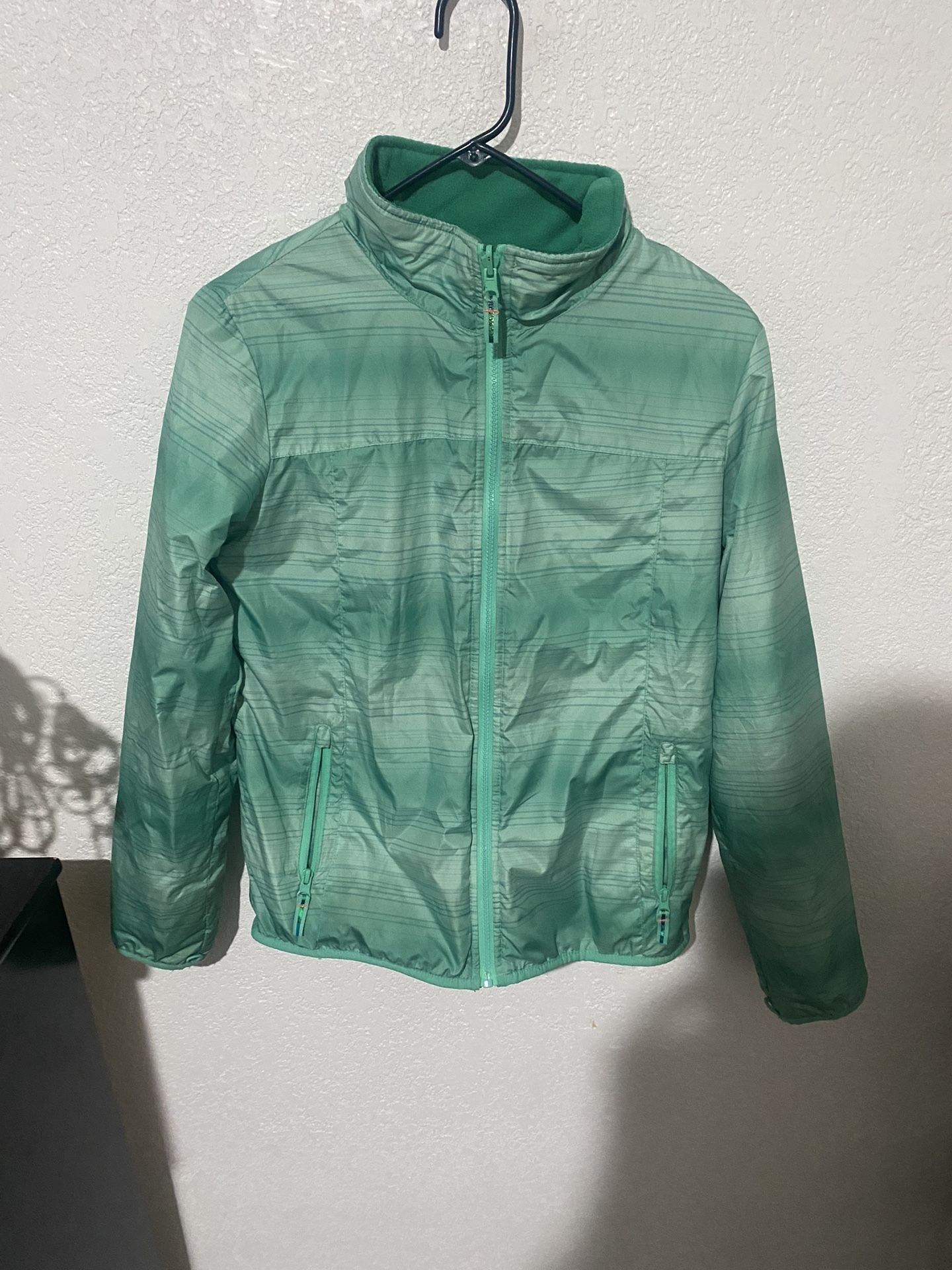 green rain jacket
