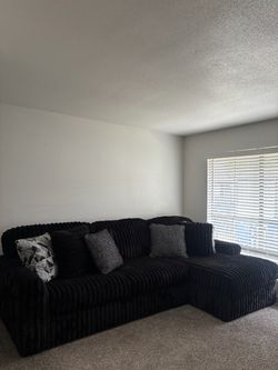 Fluffy black couch