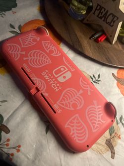 Nintendo switch lite (Coral Japan Version)