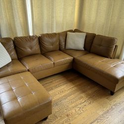 Faux Leather Sectional Sofa With Ottoman
