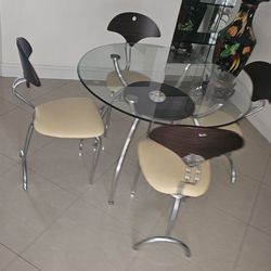 Glass wood and leather dining room table and 4 chairs
