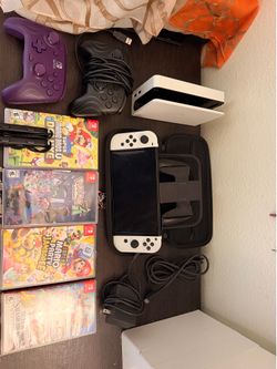 Nintendo switch oled with games and accessories