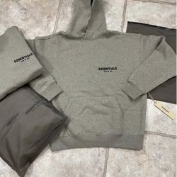 Essentials Hoodie Dark Oatmeal sizes below!