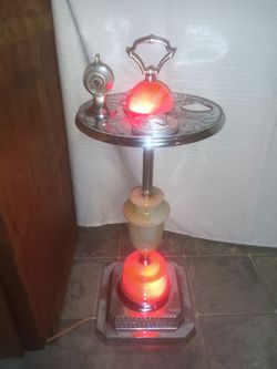 Marble ash tray lights up I think it is from the 50s