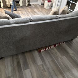 sofa and love seat gray with 4 pillows