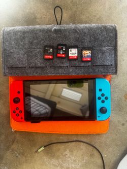 Nintendo Switch Bundle + Dock + Extra Joy-Con + 4 Games