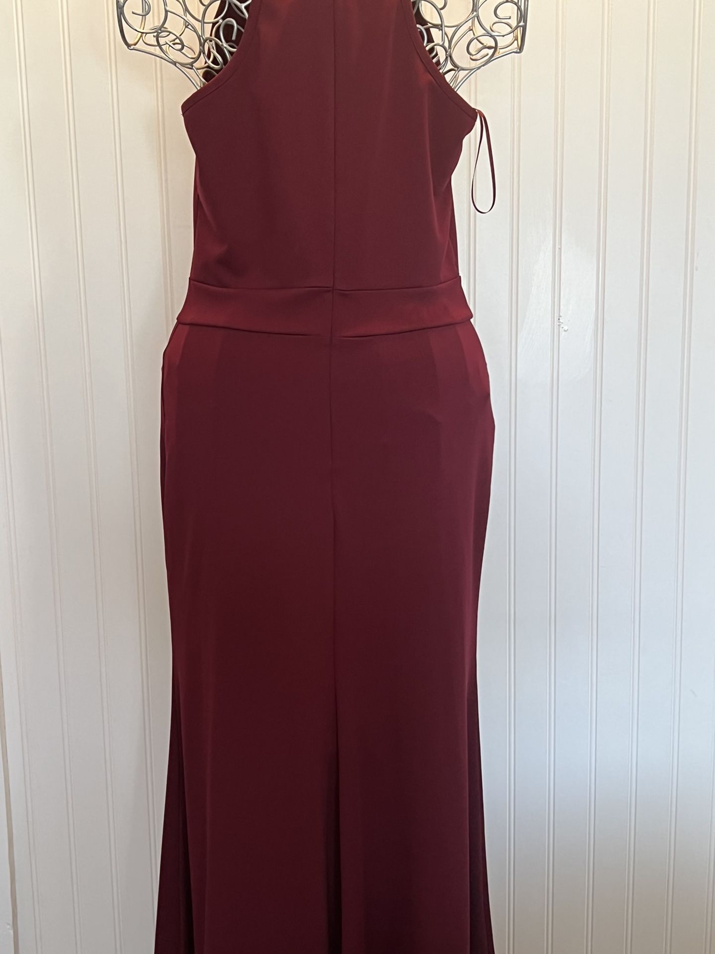 Beautiful wine color party dress Size S The fabric stretches