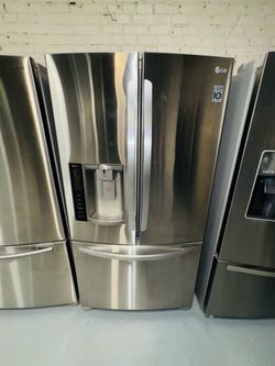 LG stainless steel refrigerator (36" x 69" x 29") with a receipt for a 90-day warranty.