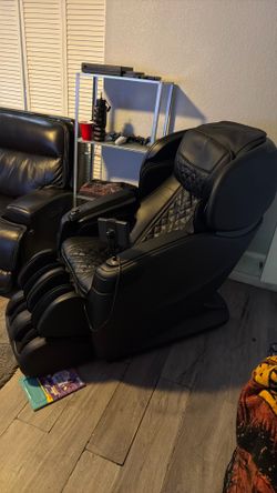 High end black massage chair with Bluetooth speakers and lights