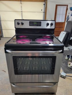 Frigidaire glasstop stove(delivery available)