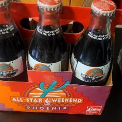vintage Coca-Cola commemorative bottles from the 1995 NBA All-Star Weekend held i