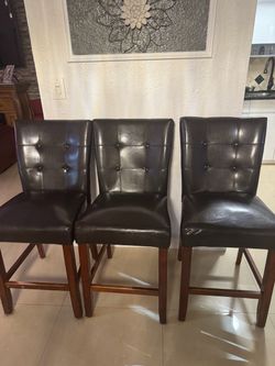 set of 3 stools  brown wood from city furniture good condition