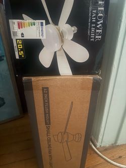 Ceiling Fans in boxes never used 50 dollars per fan and bonus flower light if you buy both…