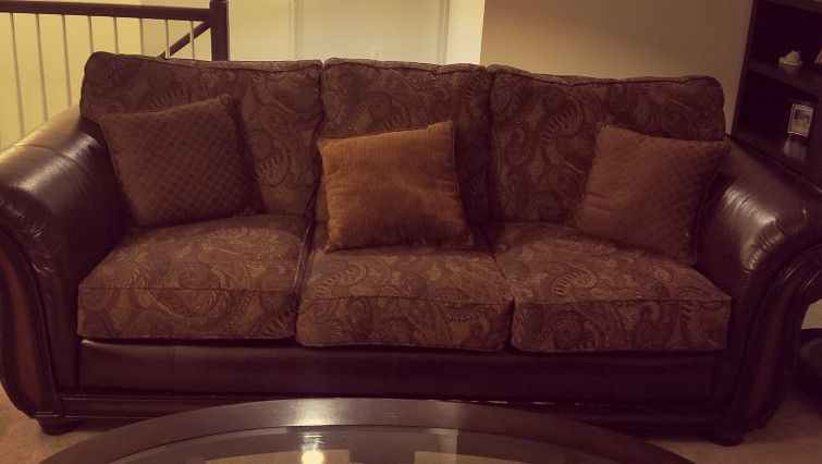 Brown leather and fabric sofa and loveseat