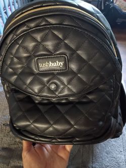 Tush baby carrier