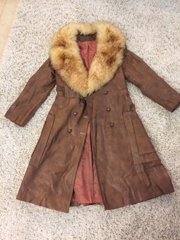 coat with fur neck by suede and leather