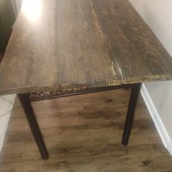 100 year old reclaimed farmhouse dining table with refurbished metal bottom