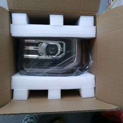GMC Sierra Headlight 