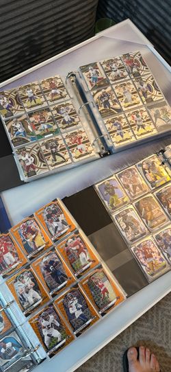NFL binders football card lot roughly 1500 cards among 4 binders. NFL 22-24 mostly. Half inserts half base