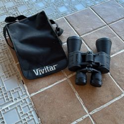 Vivitar 7x50.  297 Ft At 1000 Yds ,coated Optics
