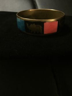 Brass bracelet with elephants