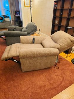 Pair of Ashley Electric Recliners.
