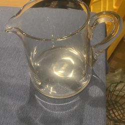 Vintage Heavy duty glass pitcher .