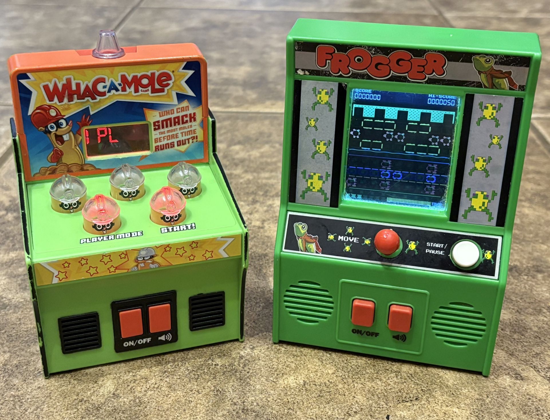 Handheld electronic arcade games Frogger and Whac-A-Mole
