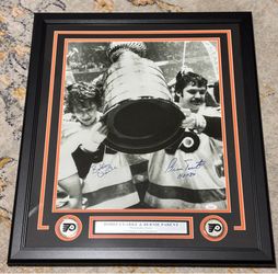 PHILADELPHIA FLYERS Autographed Stanley Cup Photo. Professionally Framed. Measures 22x26. Includes JSA COA
