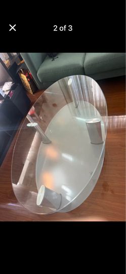 Two tier glass coffee table