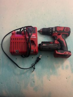 Milwaukee drill and charger