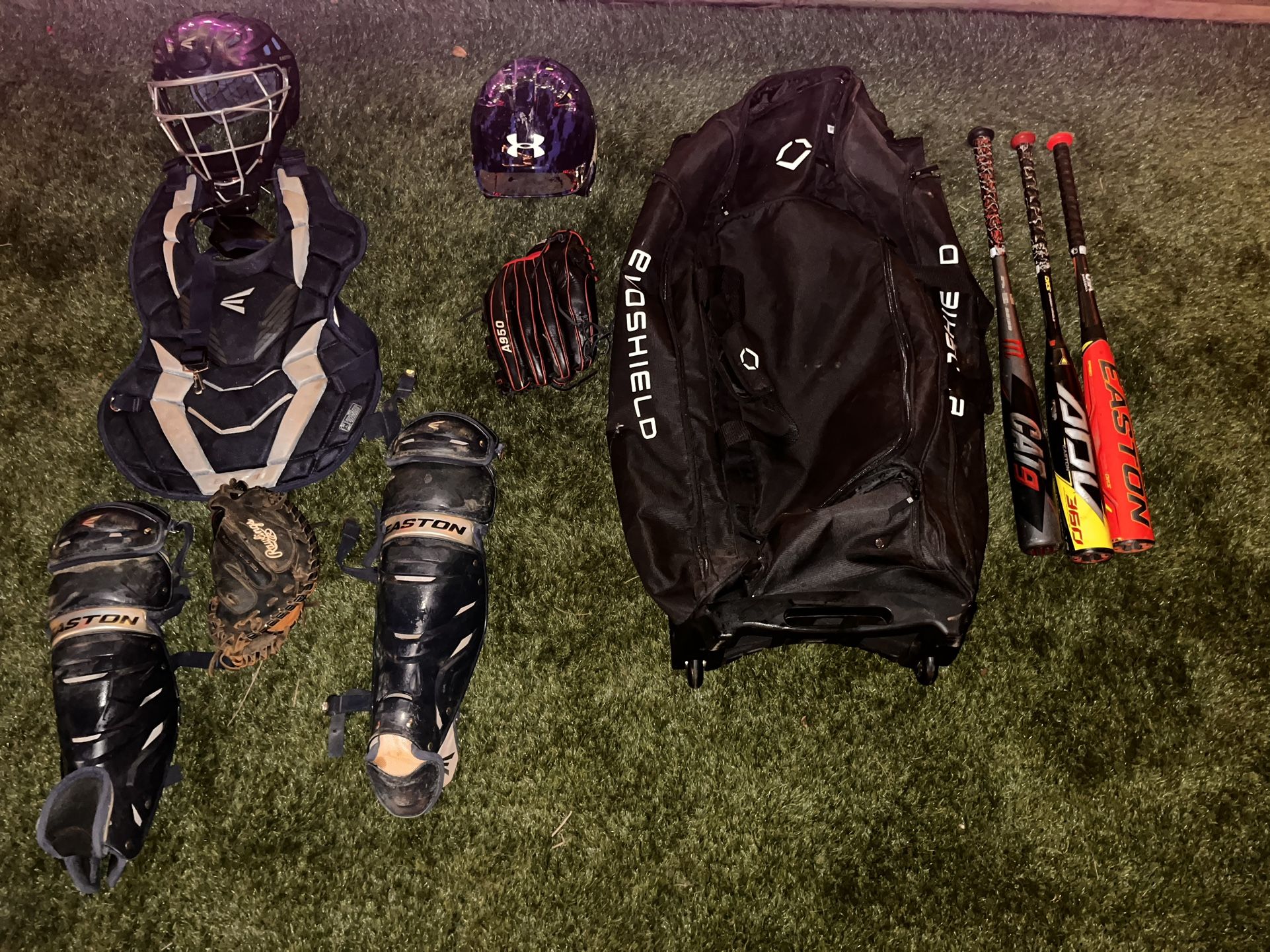 full base ball gear catcher gear and baseball bats