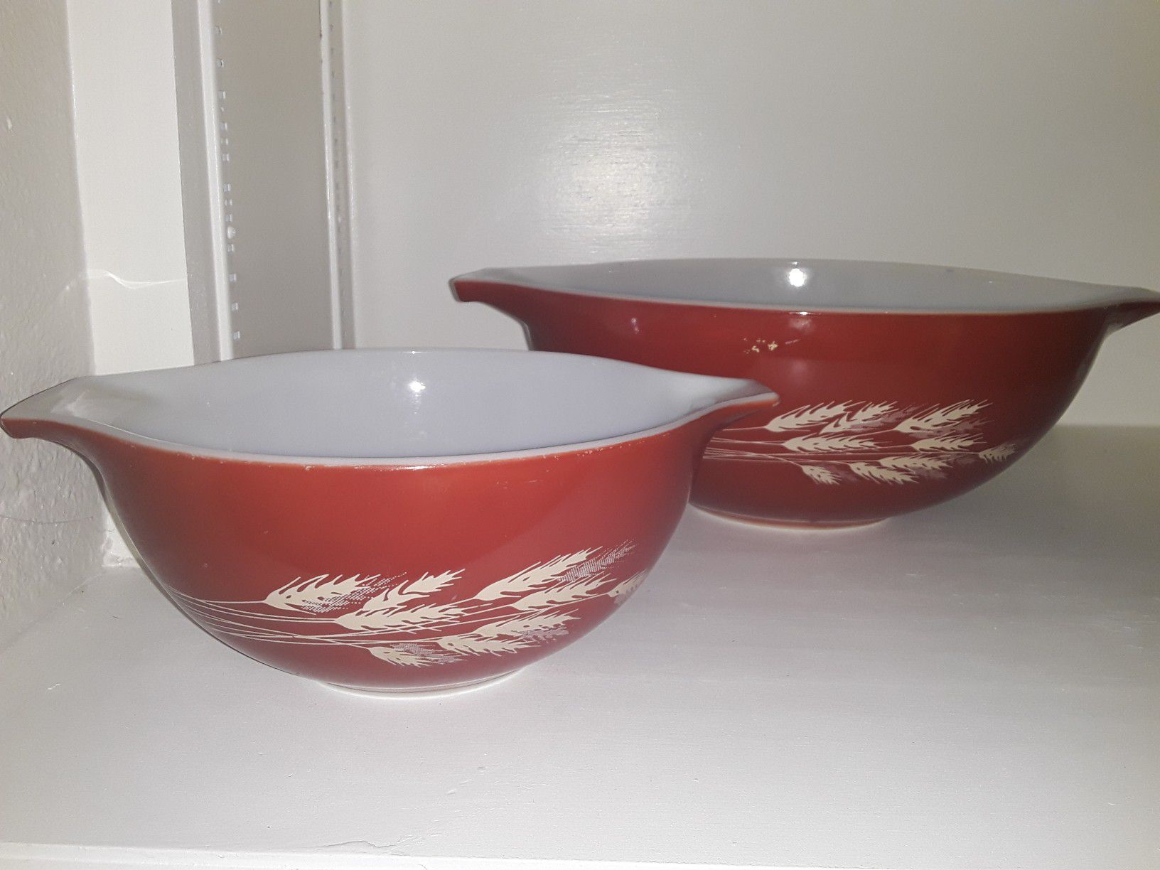 Pyrex harvest wheat nesting bowls. Two: one large and one small.