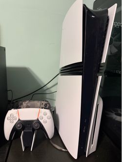 PS5 Pro with disc drive, 2 controllers, charging dock