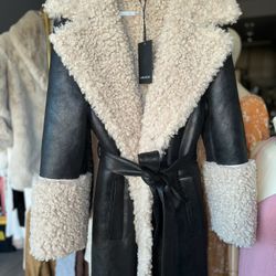 LAMARQUE : The POLLY Mixed Media Maxi Coat makes a striking statement with its floor-grazing length and bold faux shearling 