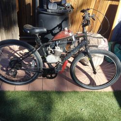 Specialiized Black Bike With Pedal Assist Gas Motor