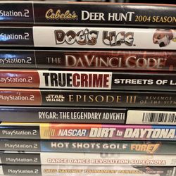 10- PS2 game lot. DDR-Hot Shots Golf- Paintball- Davinci Code-Dogs Life-Nascar. 