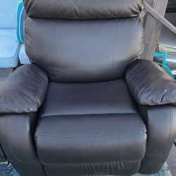 Black Leather Lounge Chair $100 Obo..