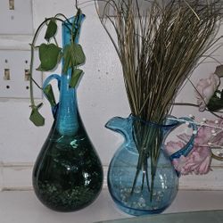 Two Beautiful Glass Vases 
H17" Diameter 6.5" H8" Diameter 6.5" $45 Each 
