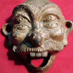 Antique Cast Iron Bottle Opener 4 Eyes 