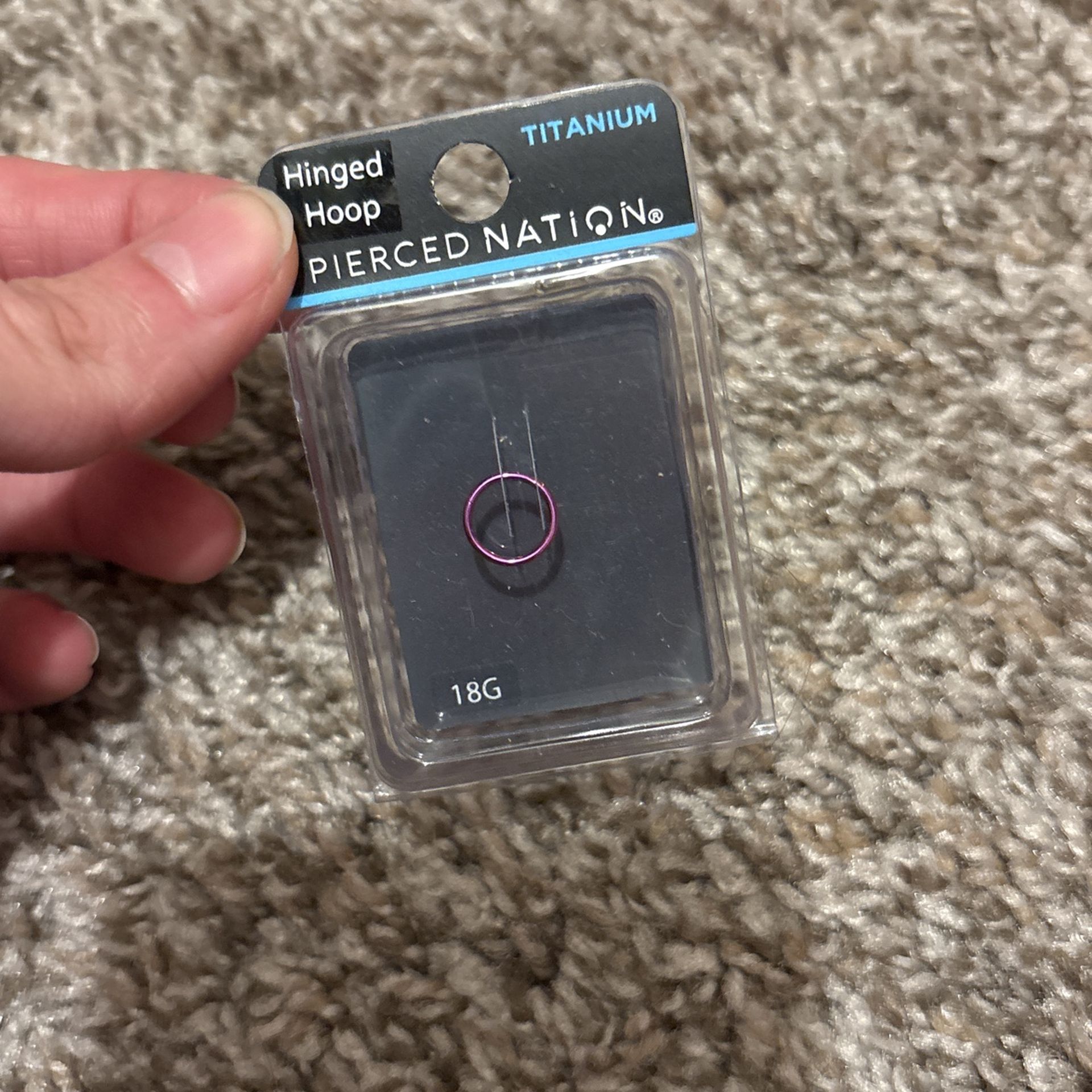 pink / magenta nose hoop