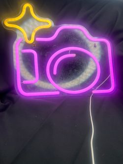 Neon instagram camera sign