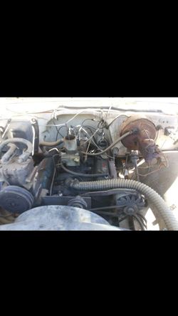 Chevy small block intake, carburetor and stock air cleaner