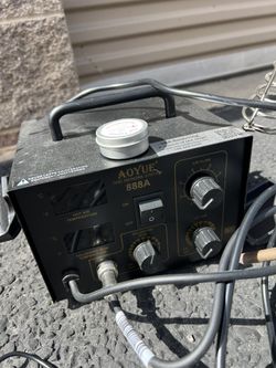 Aoyue 888A SMD rework station with temperature controls.