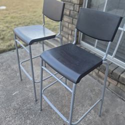 Bar  stool with backrest.