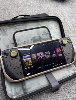 Like New 1TB OLED Black
Handheld Gaming  With
Extras