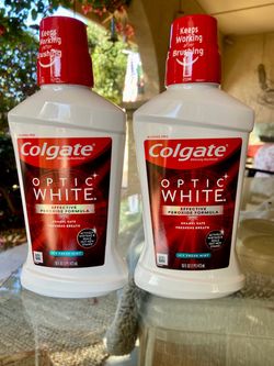 New Colgate Optic White whitening mouthwash in Icy Fresh Mint flavor. This alcohol-free formula is enamel safe; 16 fl oz